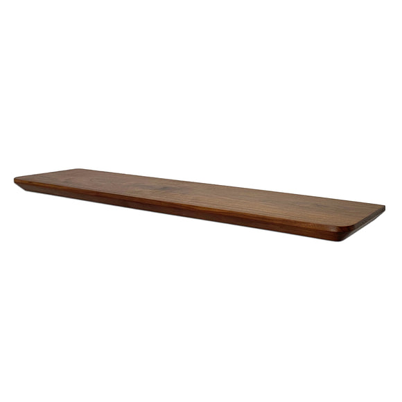 Solid American Walnut Floating Timber Shelf made to order in custom sizes. Australian Made floating shelves for residential, commercial and hospitality interiors. Australian Made Floating Timber Shelves. Curved Corners and Bevelled Profile Shelf Detail.