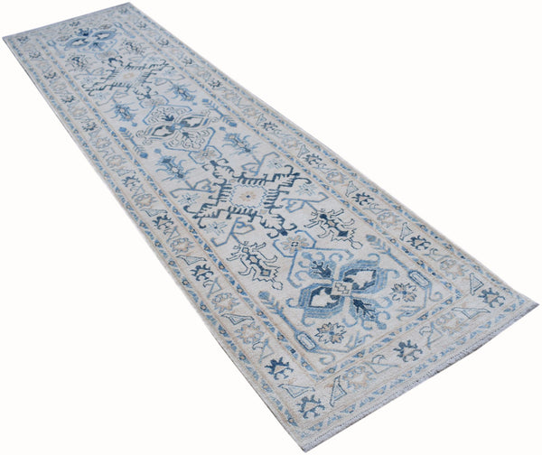 Authentic Hallway Runner Made in Afghanistan. Striking blue colours on a handknotted rug. Available online or in our Melbourne showroom
