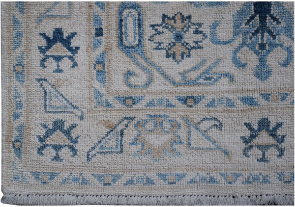 Authentic Hallway Runner Made in Afghanistan. Striking blue colours on a handknotted rug. Available online or in our Melbourne showroom