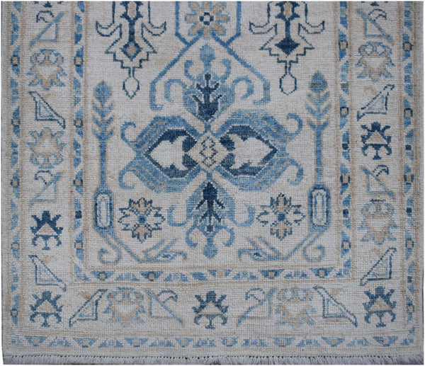 Authentic Hallway Runner Made in Afghanistan. Striking blue colours on a handknotted rug. Available online or in our Melbourne showroom