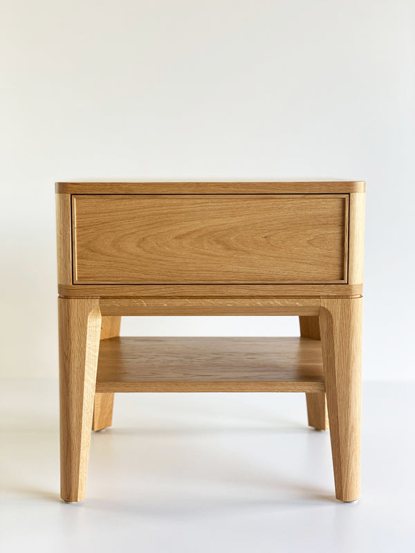 Solid American Oak Bedside Table featuring large drawer and shelf. Australian Made solid timber furniture custom made to your dimensions and style. Furniture Made in Melbourne.