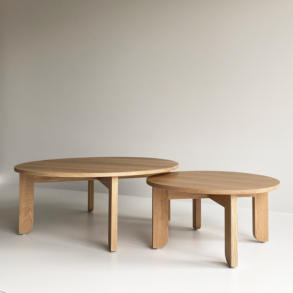 Round Oak Coffee Table in Solid American Oak Timber. Made in Melbourne, the Lunar Round Nesting Coffee Tables feature soft curves and half arch details to create lightness at the base of the leg. Australian made with custom sizes available.