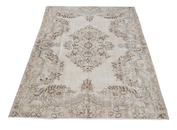 Vintage Handmade Turkish Rug with cream base and brown floral pattern. Dated from the 1960's. Traditional Vintage Turkish Rug available in Melbourne