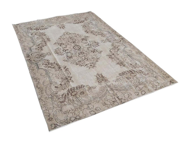 Vintage Handmade Turkish Rug with cream base and brown floral pattern. Dated from the 1960's. Traditional Vintage Turkish Rug available in Melbourne